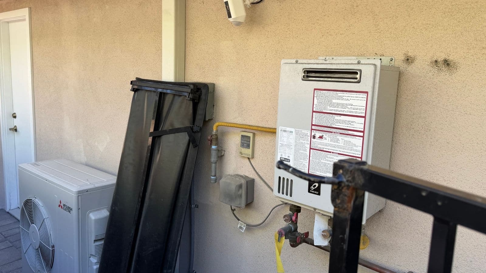 Tankless water heater installation mounted and connected at Glendale home
